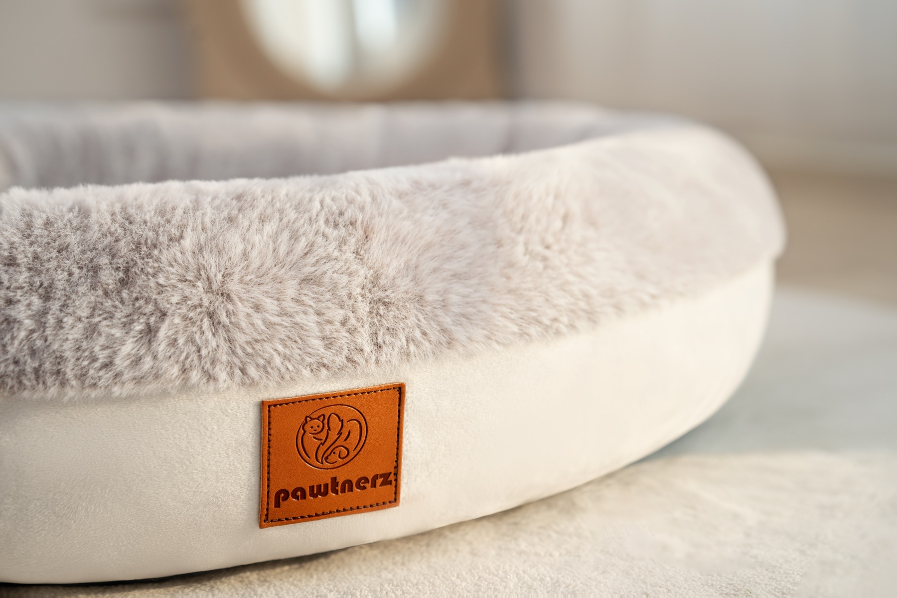 Pawtnerz branded leather patch on the pet bed
